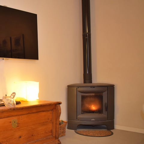 Cosy up by the log burner when the Mallorcan air turns chilly