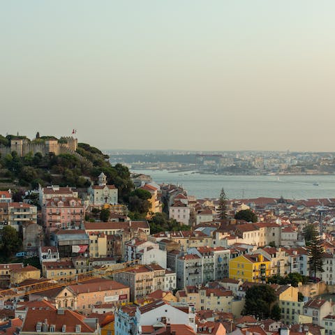 Fall in love with Lisbon's viewpoints, food, and bars from your central base
