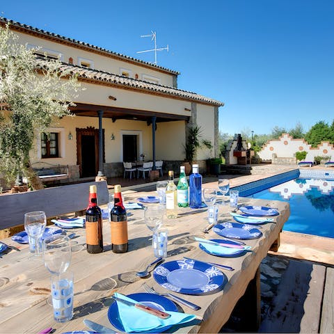 Share some Spanish wine and delicious meals in the outdoor dining area