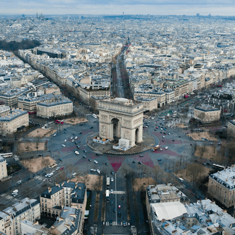 Soak up the vibrant heart of Paris with a walk to the Arc de Triomphe