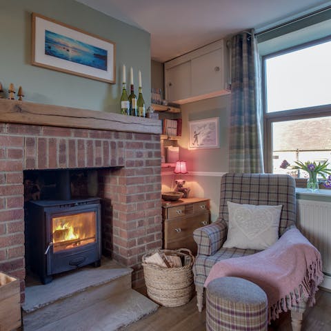 Get the fire roaring, snuggle under a blanket and read your book in the cosy nook