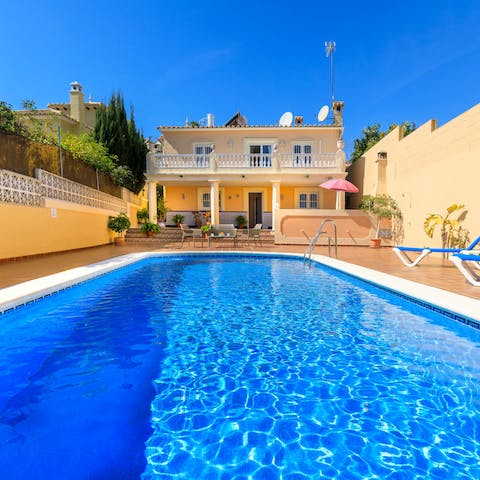 Spend long, hot afternoons dipping in and out of your pool