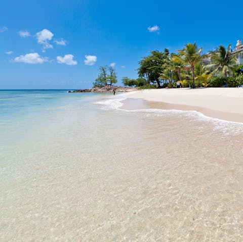 Stretch out on Godings Bay Beach, mere footsteps from your apartment