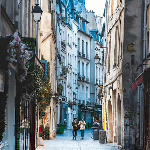 Wander around the historic streets of Le Marais, a few streets away from your front door