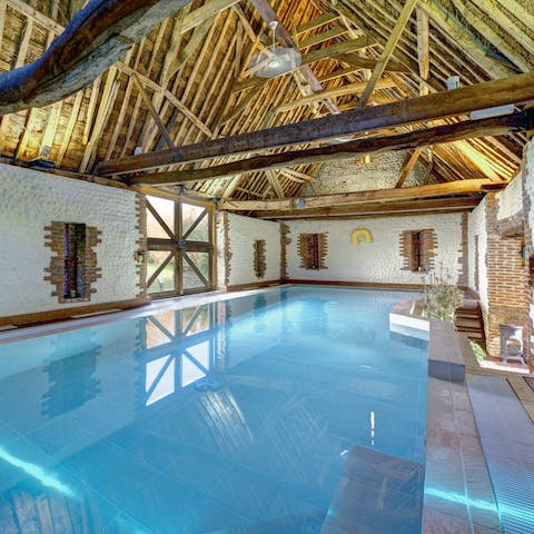 Go for a dip in the heated indoor pool under a striking vaulted ceiling