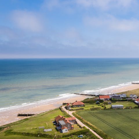 Sunbathe on Leas Beach, just a ten-minute walk from the cottage