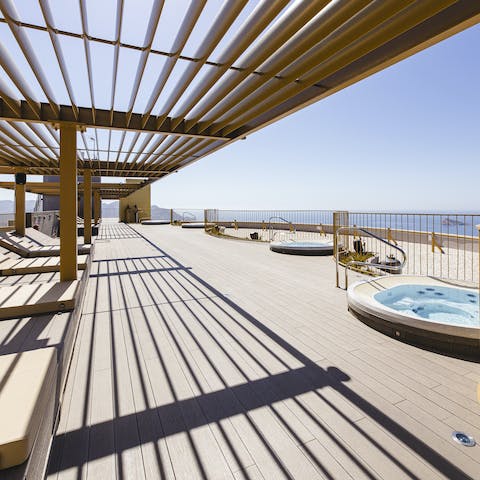 Soak up the sun from the roof terrace – will you relax in a hot tub or stretch out on a sun lounger?
