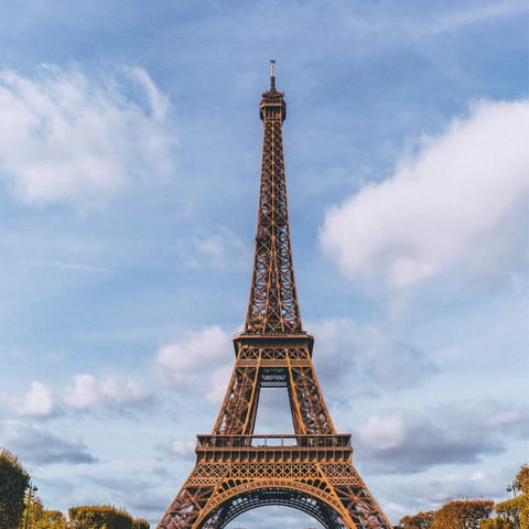 Start your sightseeing at the Eiffel Tower, a short walk away