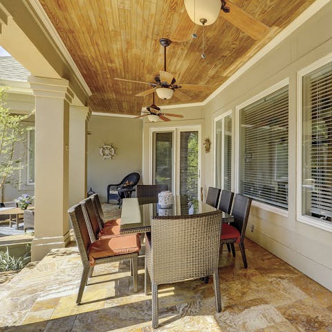 Dine alfresco in the Italian style loggia