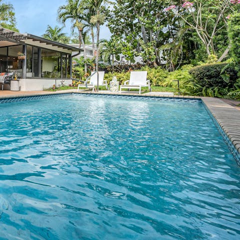 Swim gentle laps in the heated swimming pool