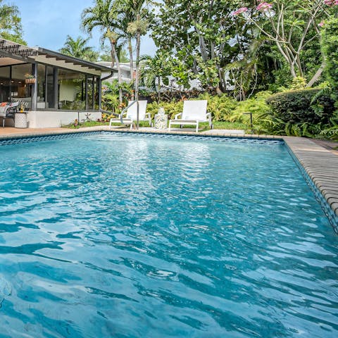 Swim gentle laps in the heated swimming pool 