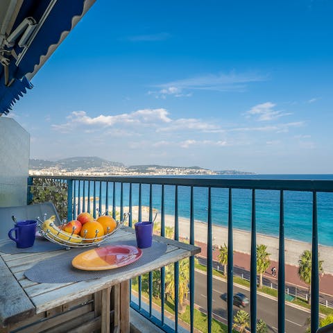Enjoy breakfast on the private balcony while feasting on sea views