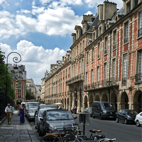 Breakfast on croissants and coffee in nearby Place des Vosges