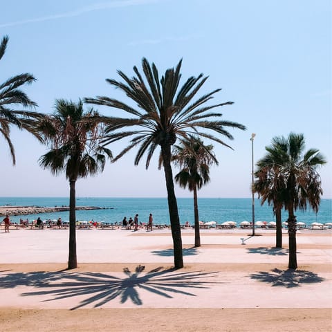 Sink your toes in the sand at Barceloneta Beach, twenty minutes away on foot