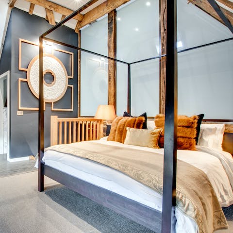 Sleep like royalty in the luxury four-poster beds