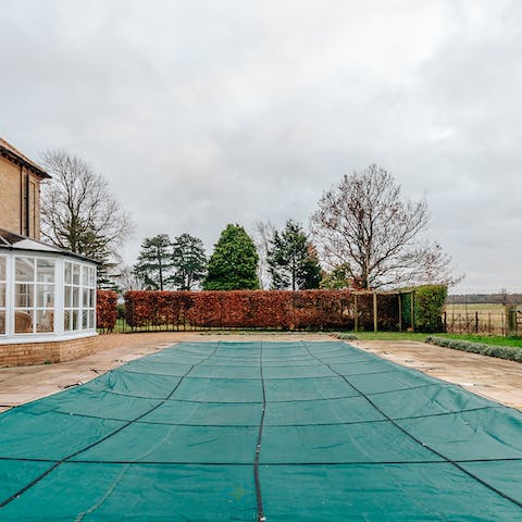 Uncover the heated pool and go for a dip
