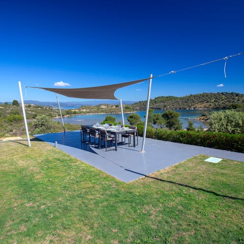 Enjoy mealtimes with a view on the covered dining space