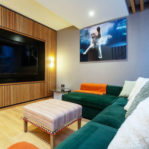 Enjoy evenings of movies in the private cinema room 