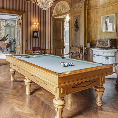 Play a game of billiards