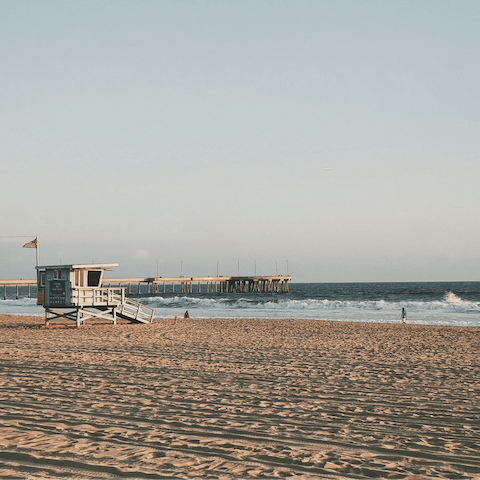 Slip on your flip-flops and take the six-minute stroll to the soft sands of Venice Beach