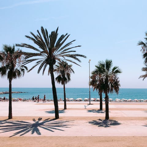 Start the day with a stroll along sunny Barceloneta Beach