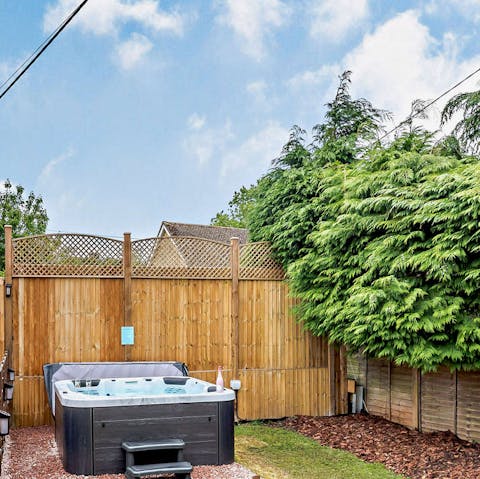 Unwind after a walk with a soak in the private hot tub