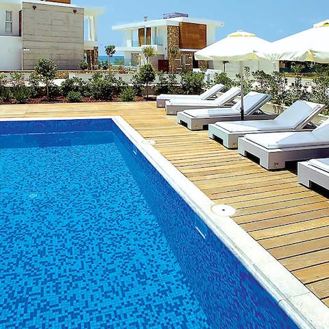 Drift away the day in your private pool