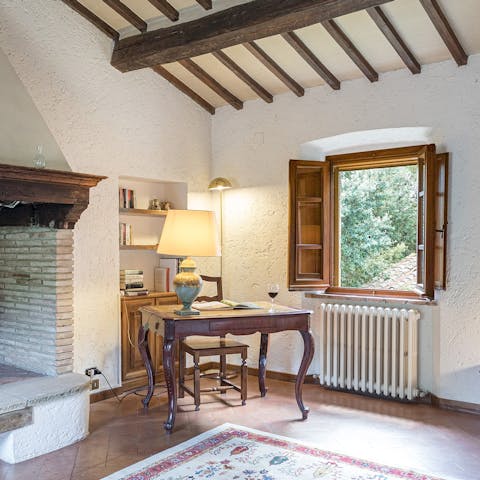 Get inspired by the scenery and work from home at the antique desk in the study