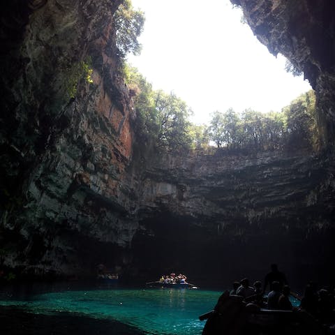 Walk just five minutes to the natural spectacle of Melissani Cave