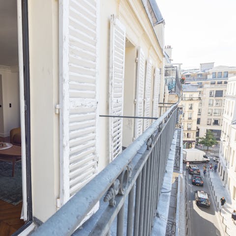 Pad out to the Juliet balcony and admire the street views