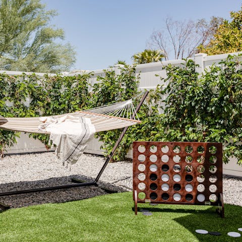 Swing the afternoon away in the hammock or challenge someone to a lawn game 