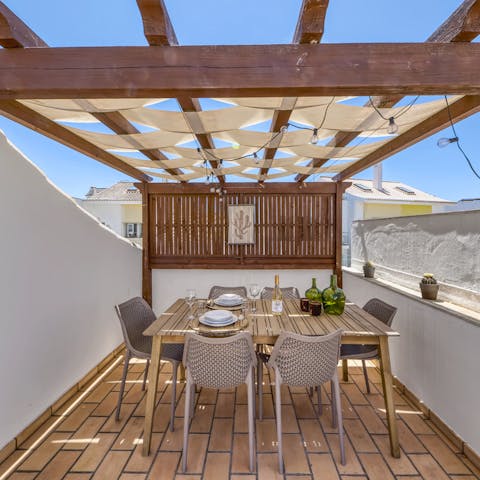 Linger over a meal on the patio, washed down with a glass of Portuguese Vinho Verde
