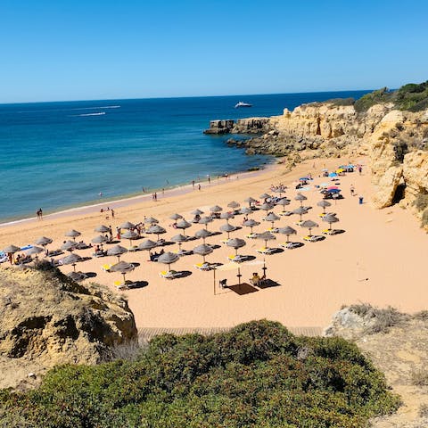 Soak up the sun on powder-soft sands – the Algarve gets around 300 days of sunshine each year