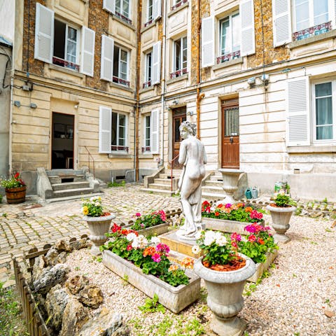 Get some fresh air in the shared courtyard with its pots of geraniums