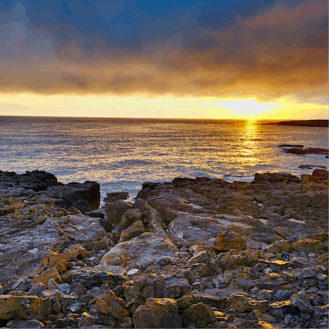 Watch the waves roll at Porthcawl Rest Bay Beach, only a five-minute walk away