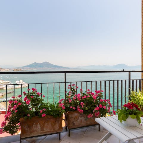 Take in the stunning views of the Bay of Naples from your balcony