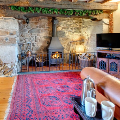 Snuggle up by the wood burner when the Welsh air turns cold