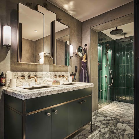 Refresh yourself in the opulent marble bathroom, with rain showers and luxury toiletries