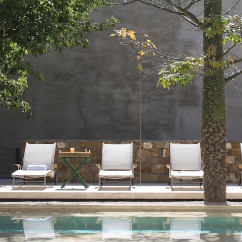 Find total relaxation whilst relaxing by the private pool