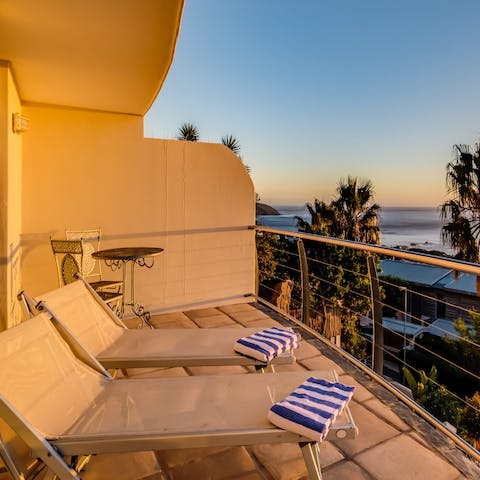 Take in the serenity of your surroundings on the sun beds on the balcony