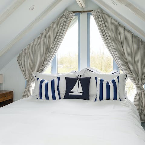 Take in the lake views from your king-size bed