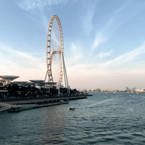 Walk down to Dubai Marina and enjoy views over the Ain Dubai