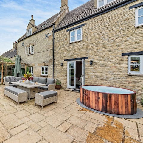 Soak in the hot tub after a day exploring the Cotswolds