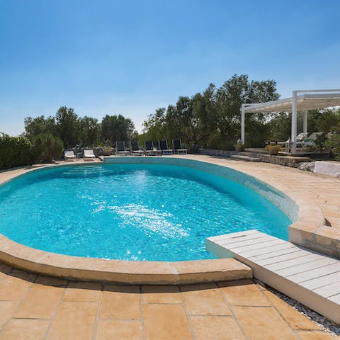 Jump into the home's swimming pool for a refreshing mid-afternoon dip