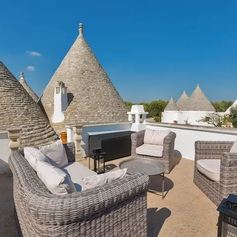 Sit on the terrace among the characterful Trulli rooftops