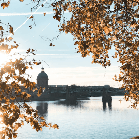 Take a sunset stroll along the Garonne River – just a short walk away
