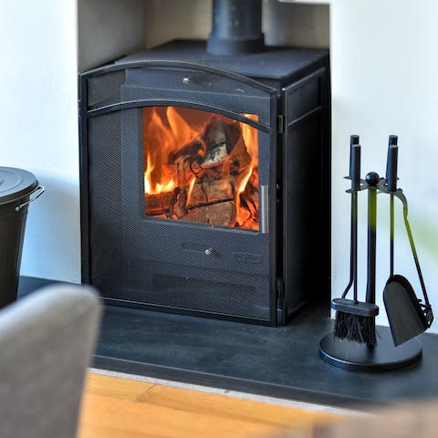 Get toasty in front of the crackling wood-burning stove