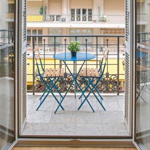 Sip an aperitif on your private balcony 