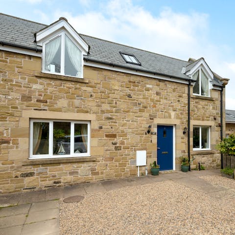 Stay in this charming stone-built cottage, in the grounds of an impressive 19th-century estate