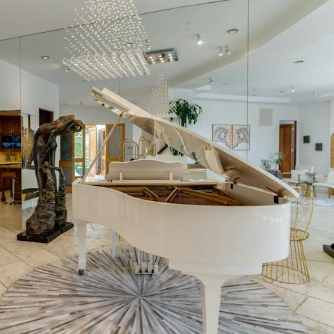Treat your fellow guests to a tune on the gorgeous grand piano